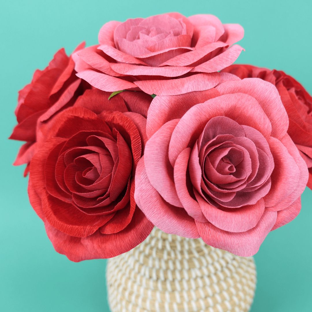 Crepe paper roses in red and pink